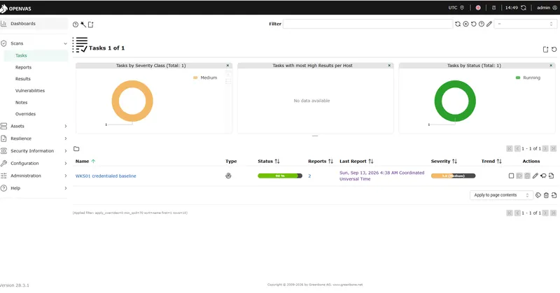 Greenbone showing a credentialed baseline scan task running against the first domain-joined workstation